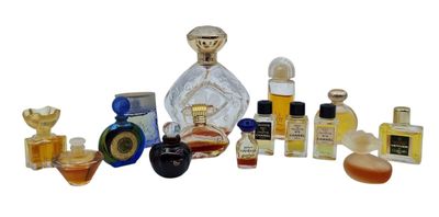 many different types of perfume bottles on a white background