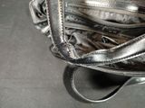 a close up of a baseball glove with a ball inside of it