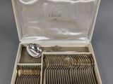 a box of silverware with a spoon and spoon in it