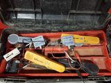 many tools in a toolbox that are sitting on the floor