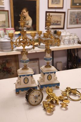 a lot of gold and blue items on the table