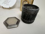 a picture of a vase and a picture of a bird on a plate