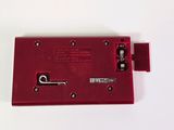 an image of a close up of a red electronic device on a white surface