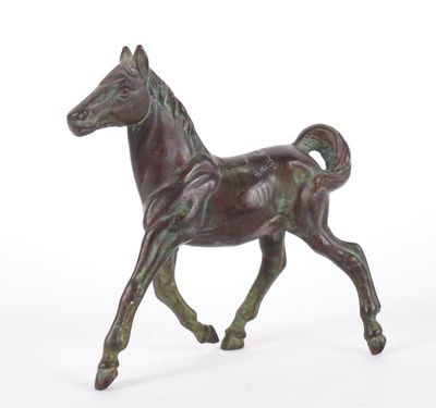 statue of a running horse on a white background