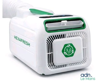 a white and green air conditioner on a white background