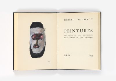 un livre ouvert sur lequel figure le portrait d'un homme