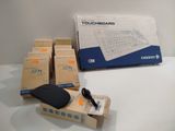 a box with a keyboard and a mouse on the table