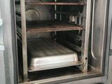 an image of a toaster oven with a pan inside of it