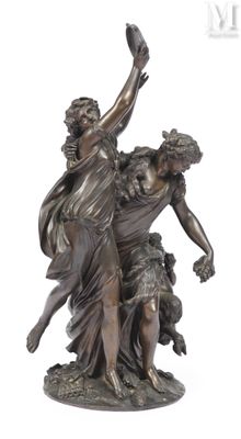 bronze statue of a woman and a child with a dog
