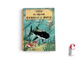a book with a picture of a black and white bird on it