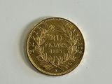 an image of a gold coin on a white surface