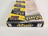 a box of game cards on a white surface