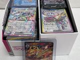 a lot of cards in the box on the table
