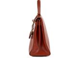 an image of a brown leather handbag on a white background