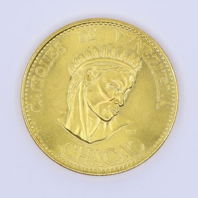 a gold coin with a picture of a queen on it