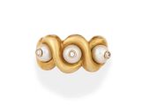 a close up of a gold ring with pearls and diamonds