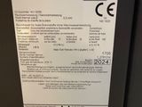 une photo d'une étiquette apposée sur une machine sur laquelle on peut lire « austrolamm »