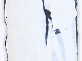 an image of a piece of paper with a torn piece of paper on it