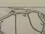 an old map of a town with a castle on the top of it