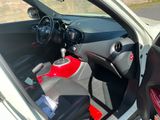a small car with a steering control in the back of it