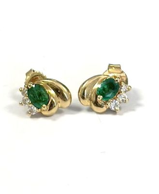 an image of a pair of emerald and diamond earrings
