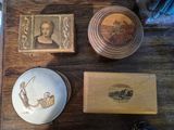 a wooden table topped with a wooden box and a picture of a woman