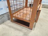 a cage that is sitting on the floor in front of a sign