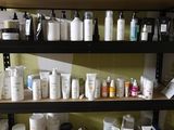 many different types of hair products on the shelves