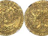 two gold coins, one of which has a man on it