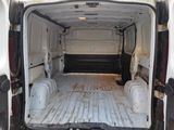 a white van that is parked in a lot
