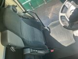a car with a steering wheel and a seat in it