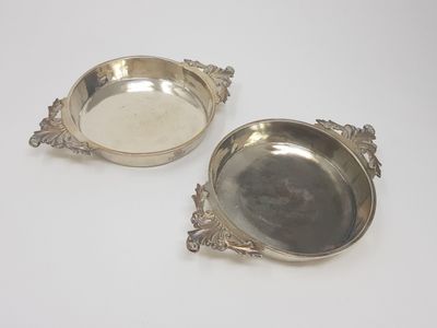 pair of silverplated serving dishes on stands