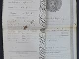 an old document with a picture of a woman ' s face on it