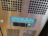 a close up of a metal box with a clock on it