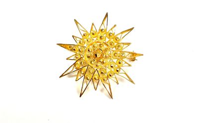 gold plated starburst brooch pin with yellow beads