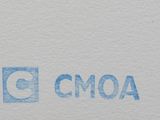 an image of a close up of a piece of paper with the word oma written on it