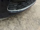 a close up view of a car ' s front bumper