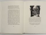 an open book with a picture of a man on it