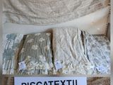 a picture of a pillow on a bed with a price tag attached to it