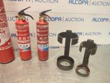 several different types of fire extinguisors are displayed on a table