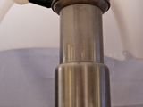 a close up view of a blender with a white handle
