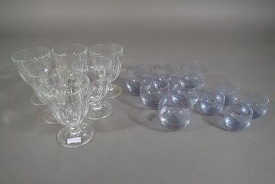 a lot of empty wine glasses sitting on a table