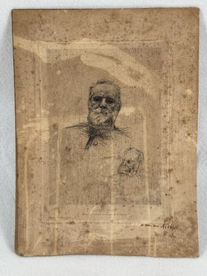 portrait d'un homme portant un chapeau et des lunettes, dans un cadre