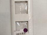a white light switch with a barcode on it