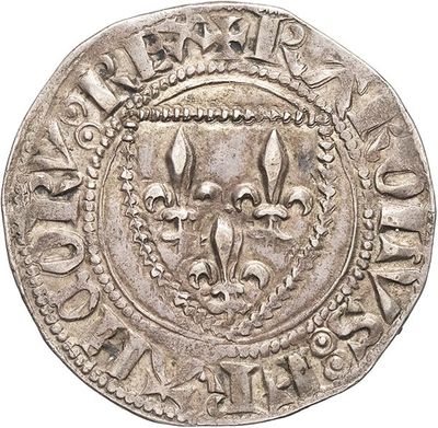 an old silver coin with a crown on it