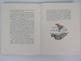 an open book with a picture of a boy riding a horse
