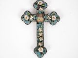 an image of a cross with a picture of a woman on it