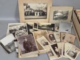 an old photo of a bunch of old photos in a box
