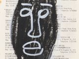 an image of a drawing of a man ' s face on a piece of paper
