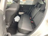 a seat in the back of a car that is empty